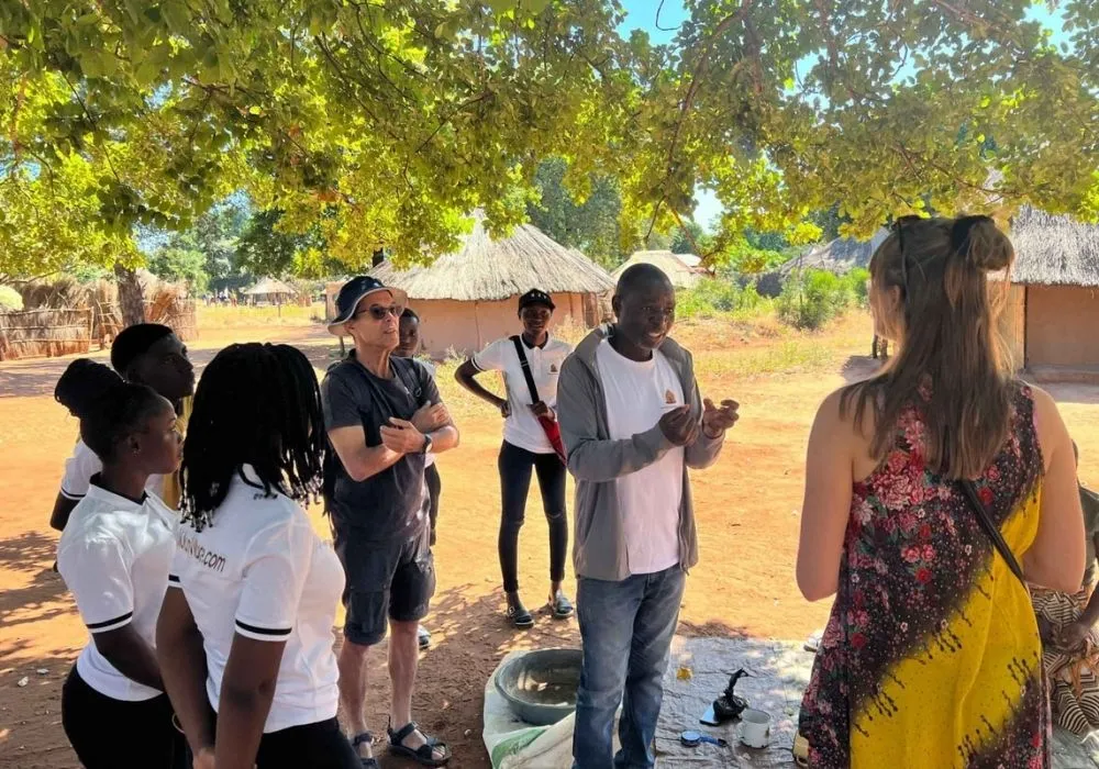 people-touring-mukuni-village-in-zambia
